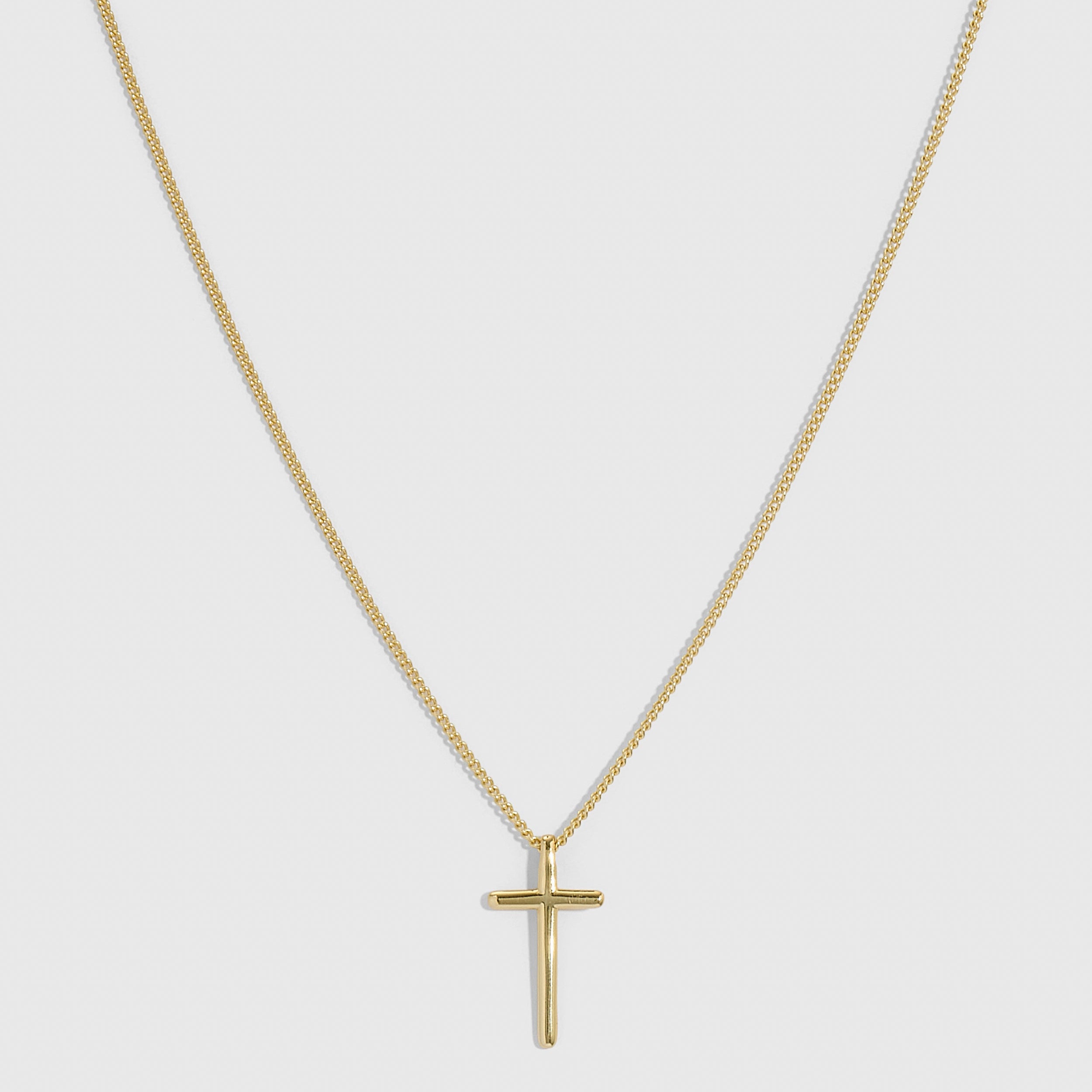 14k gold plated cross pendant necklace with a plain 20mm cross on a flat curb chain, shown on a plain background.