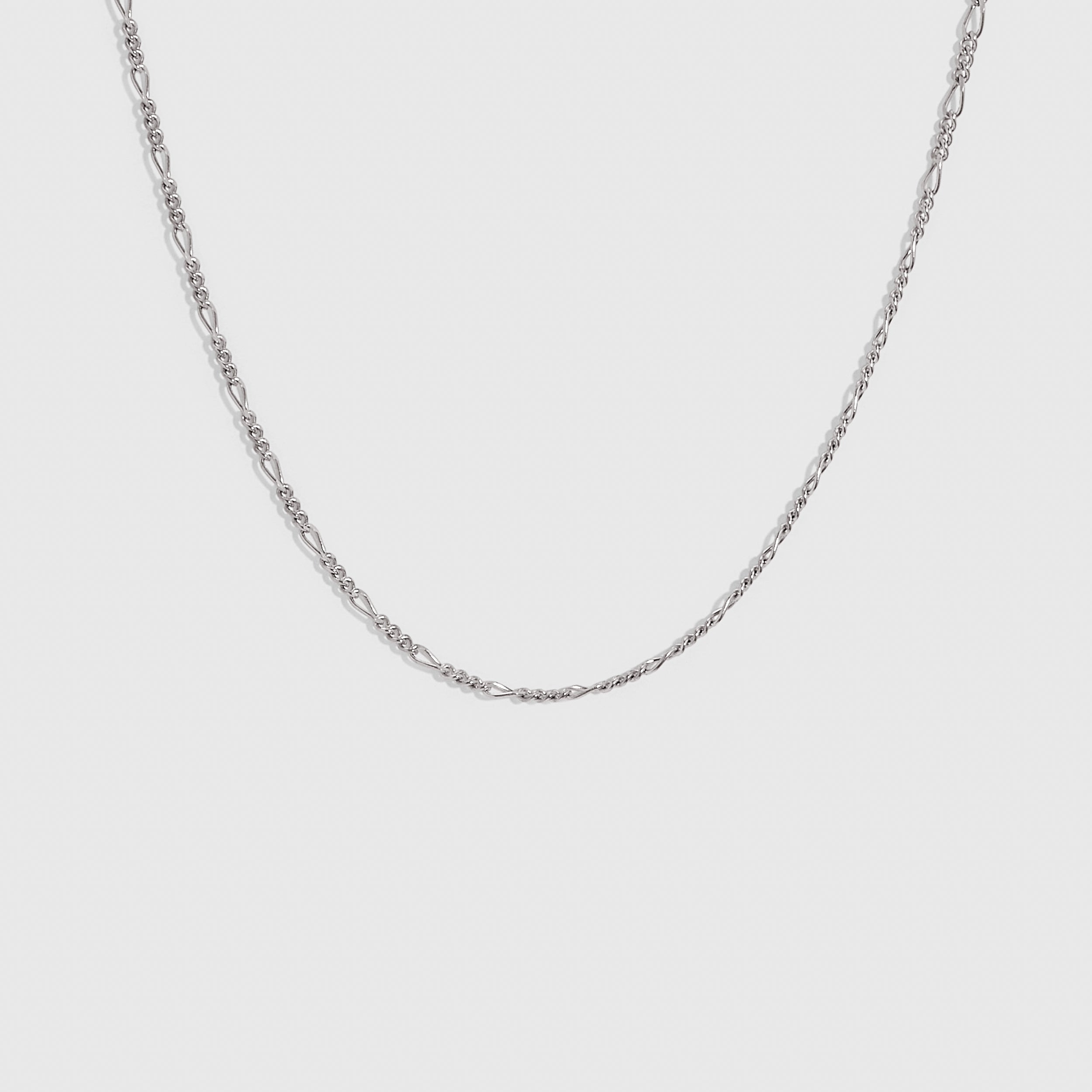 Silver Figaro link chain choker necklace, shown on a plain background.