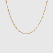 14k gold plated Figaro link chain choker necklace, shown on a plain background.