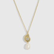14k gold plated seashell pendant necklace cradling a genuine freshwater pearl, shown on a plain background.