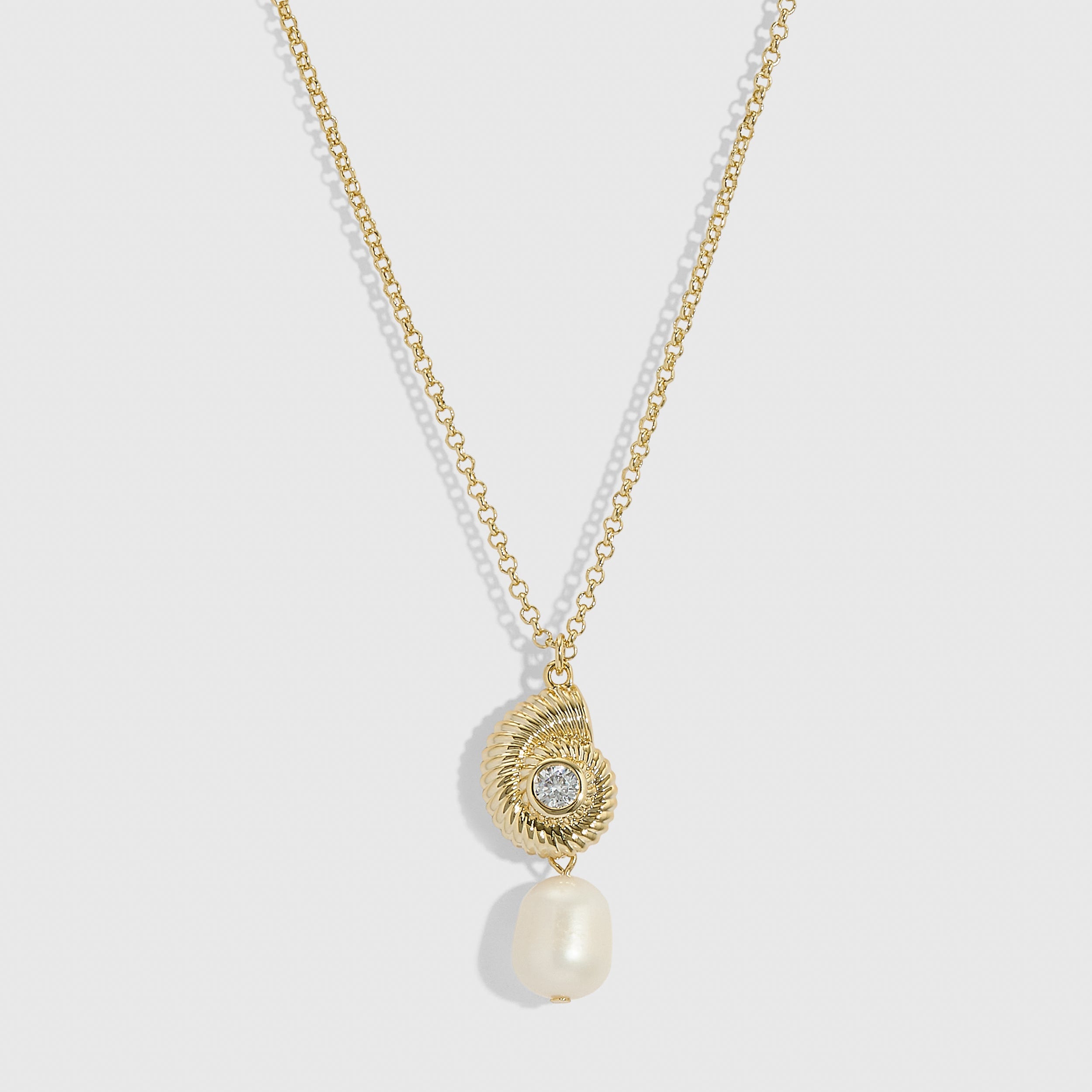 14k gold plated seashell pendant necklace cradling a genuine freshwater pearl, shown on a plain background.