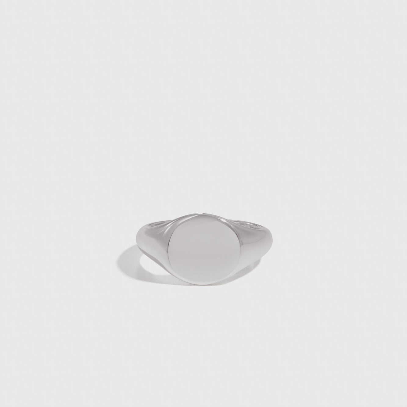Sterling silver 925 men's round signet ring, shown on a plain background.