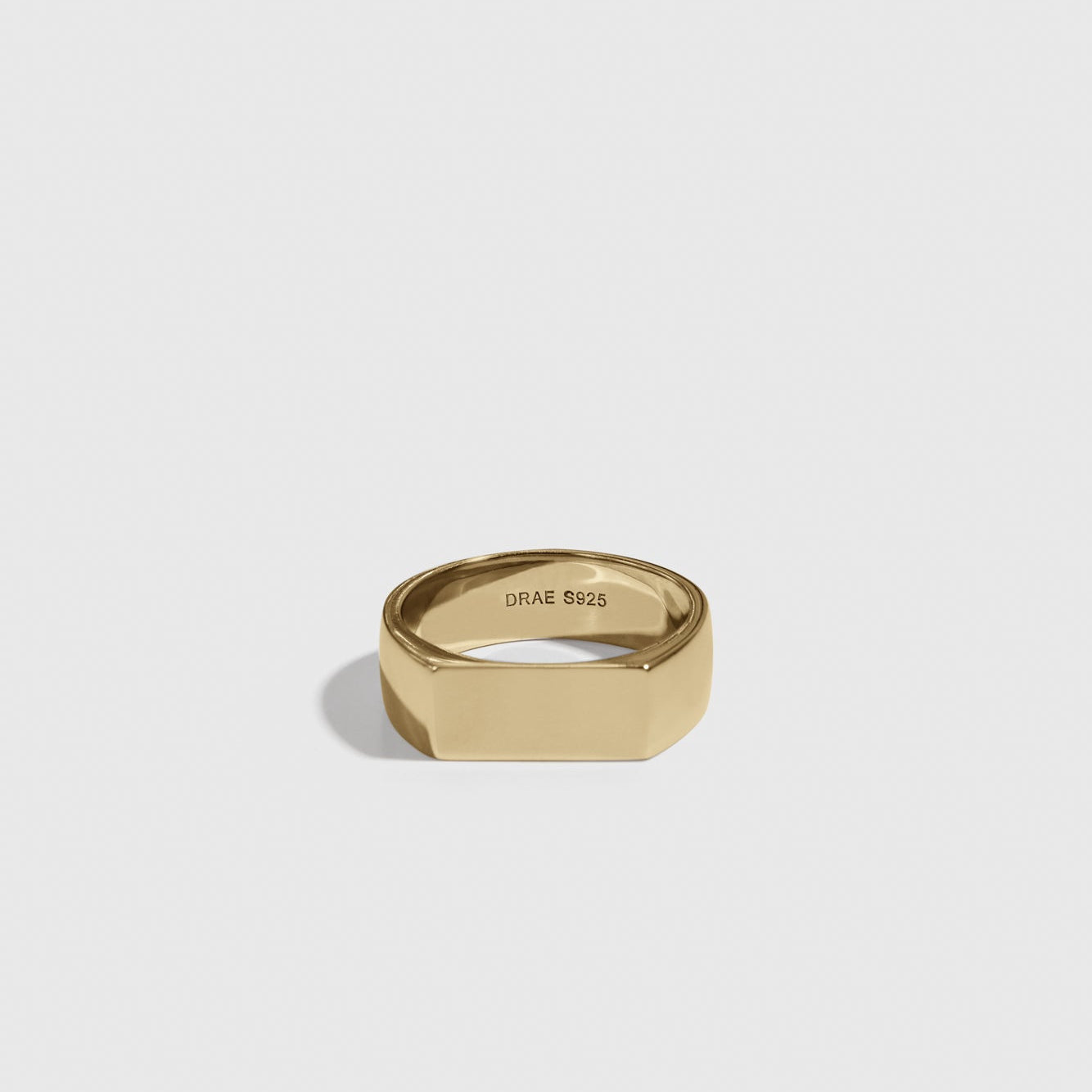 14k gold plated sterling silver 925 men's rectangular signet ring, shown on a plain background.
