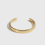 14k gold plated men's cuff bracelet, shown on a plain background.