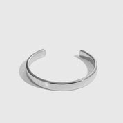 Silver plated men's cuff bracelet, shown on a plain background.