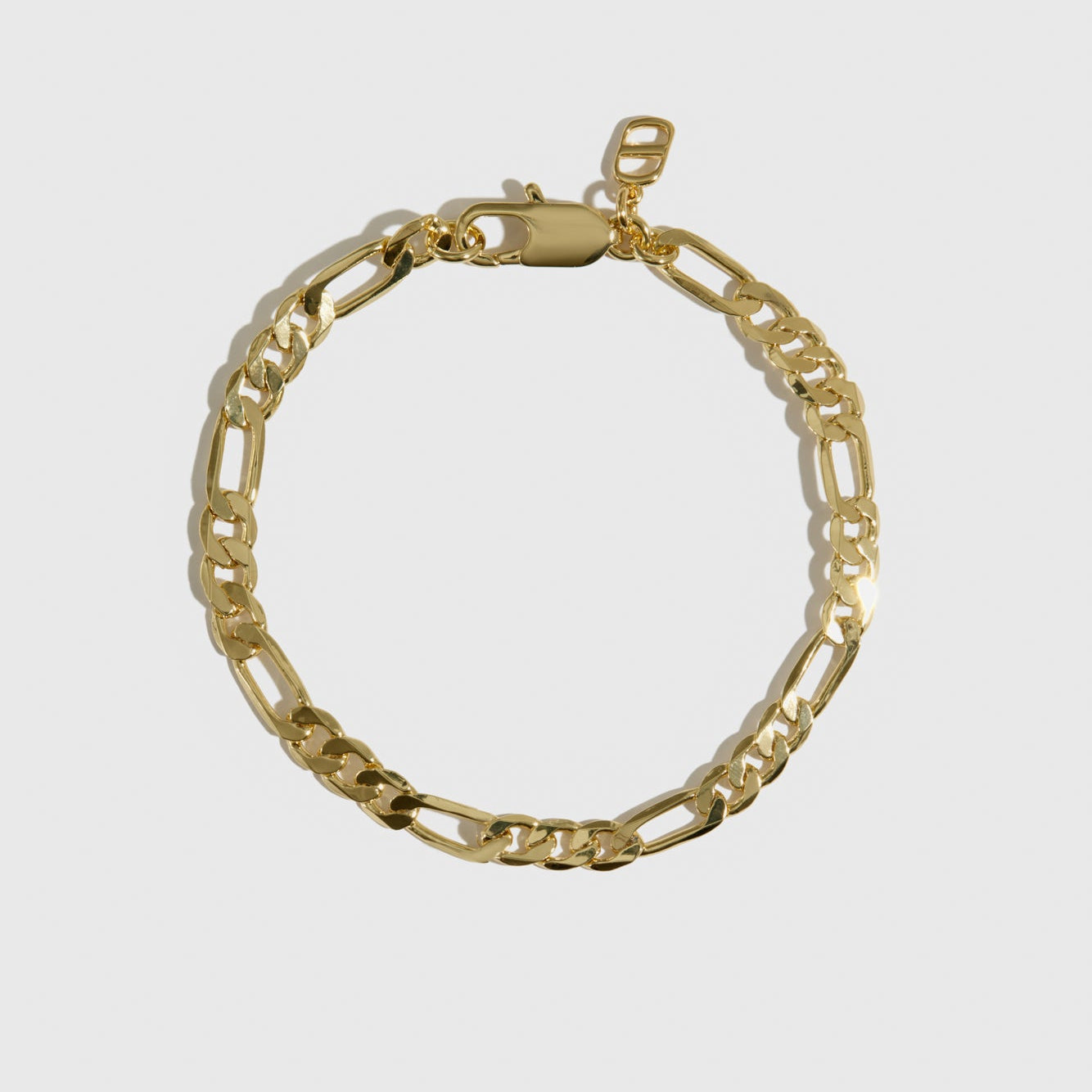 14k gold plated men's Figaro chain bracelet, shown on a plain background.