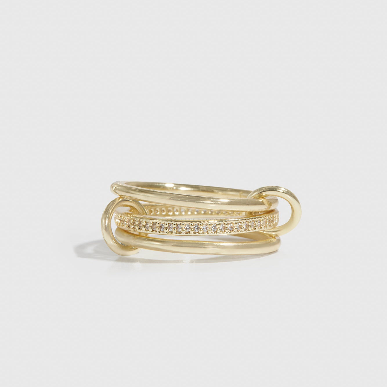 14k gold plated quintuplet dainty ring with cubic zirconia, shown on a plain background.