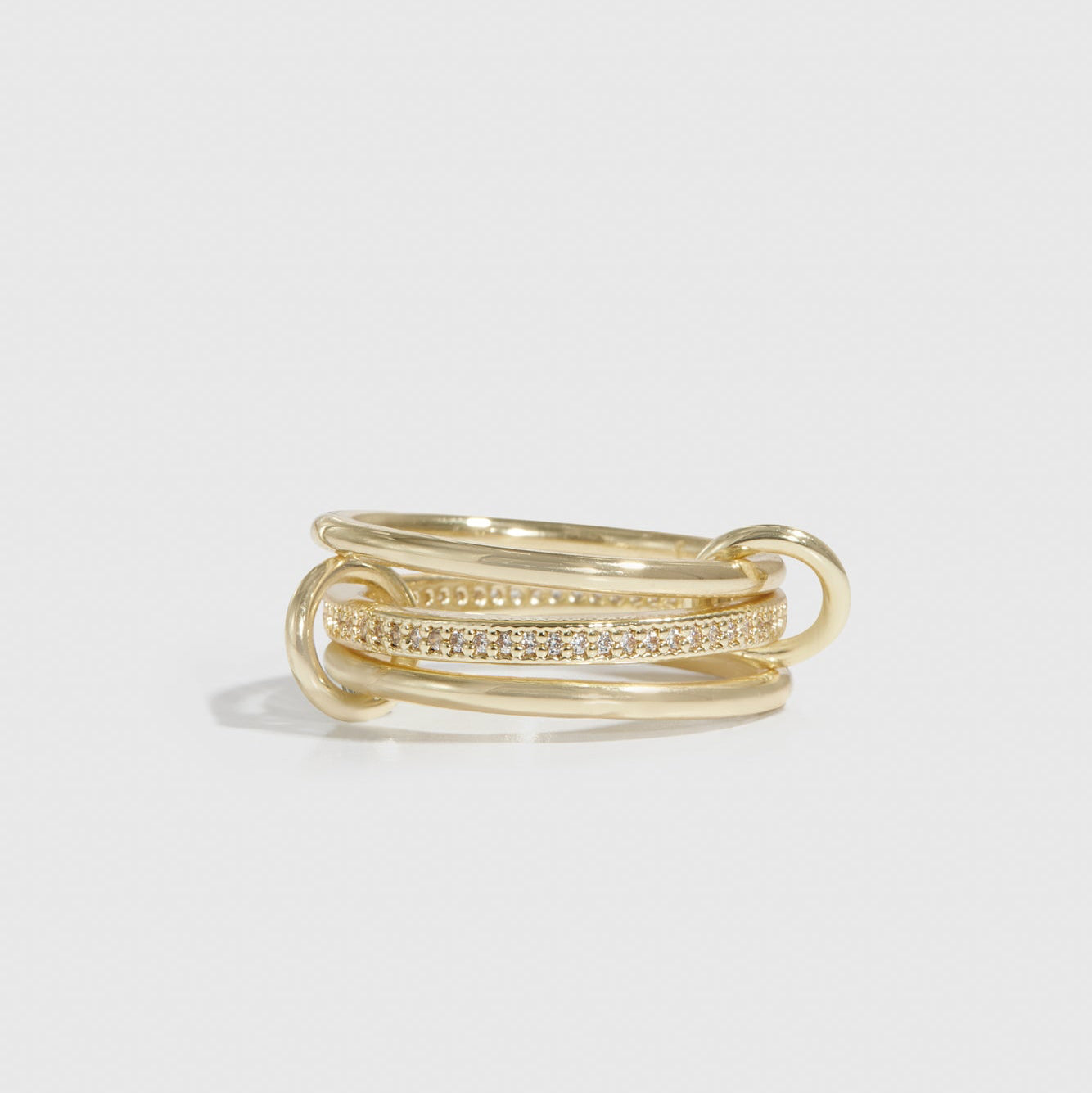 14k gold plated quintuplet dainty ring with cubic zirconia, shown on a plain background.