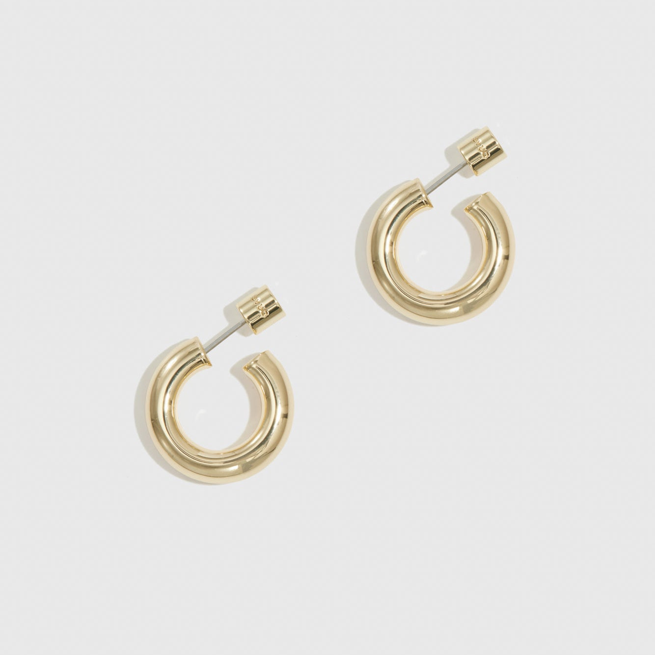 14k gold plated mini hollow hoop earrings, shown on a plain background.
