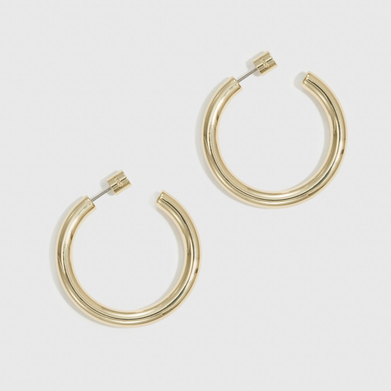 14k gold plated small hollow hoop earrings, shown on a plain background.