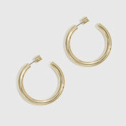 14k gold plated small hollow hoop earrings, shown on a plain background.