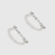 Silver plated multi-cut hoop earrings with cubic zirconia, shown on a plain background.