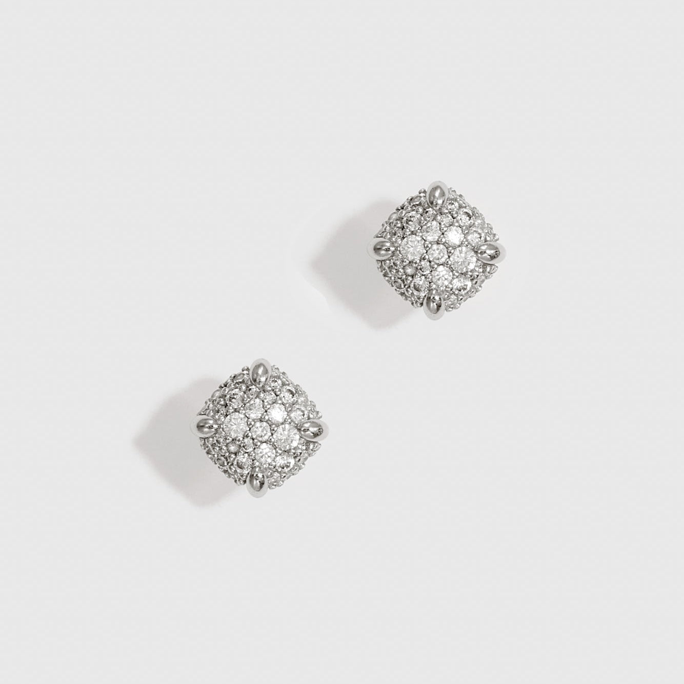 Sterling silver 925 square pavé stud earrings with cubic zirconia, shown on a plain background.