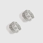 Silver plated baguette-cut pavé stud earrings with cubic zirconia pavé, shown on a plain background.