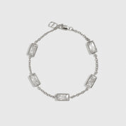 Sterling silver 925 baguette-cut multi bezel bracelet with cubic zirconia, shown on a plain background.