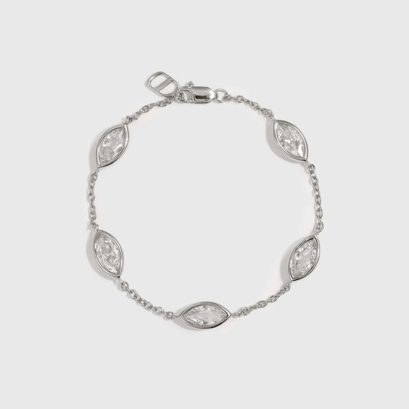 Sterling silver 925 marquise-cut multi bezel bracelet with cubic zirconia, shown on a plain background.