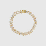 14k gold plated multi-cut tennis bracelet with cubic zirconia, shown on a plain background.