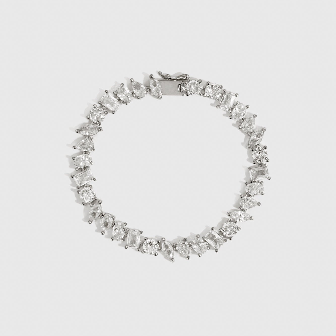Silver plated multi-cut tennis bracelet with cubic zirconia, shown on a plain background.