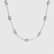 Sterling silver 925 baguette-cut multi bezel necklace with cubic zirconia, shown on a plain background.