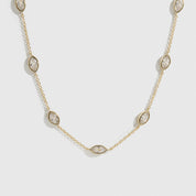 14k gold plated sterling silver 925 marquise-cut multi bezel necklace with cubic zirconia, shown on a plain background.