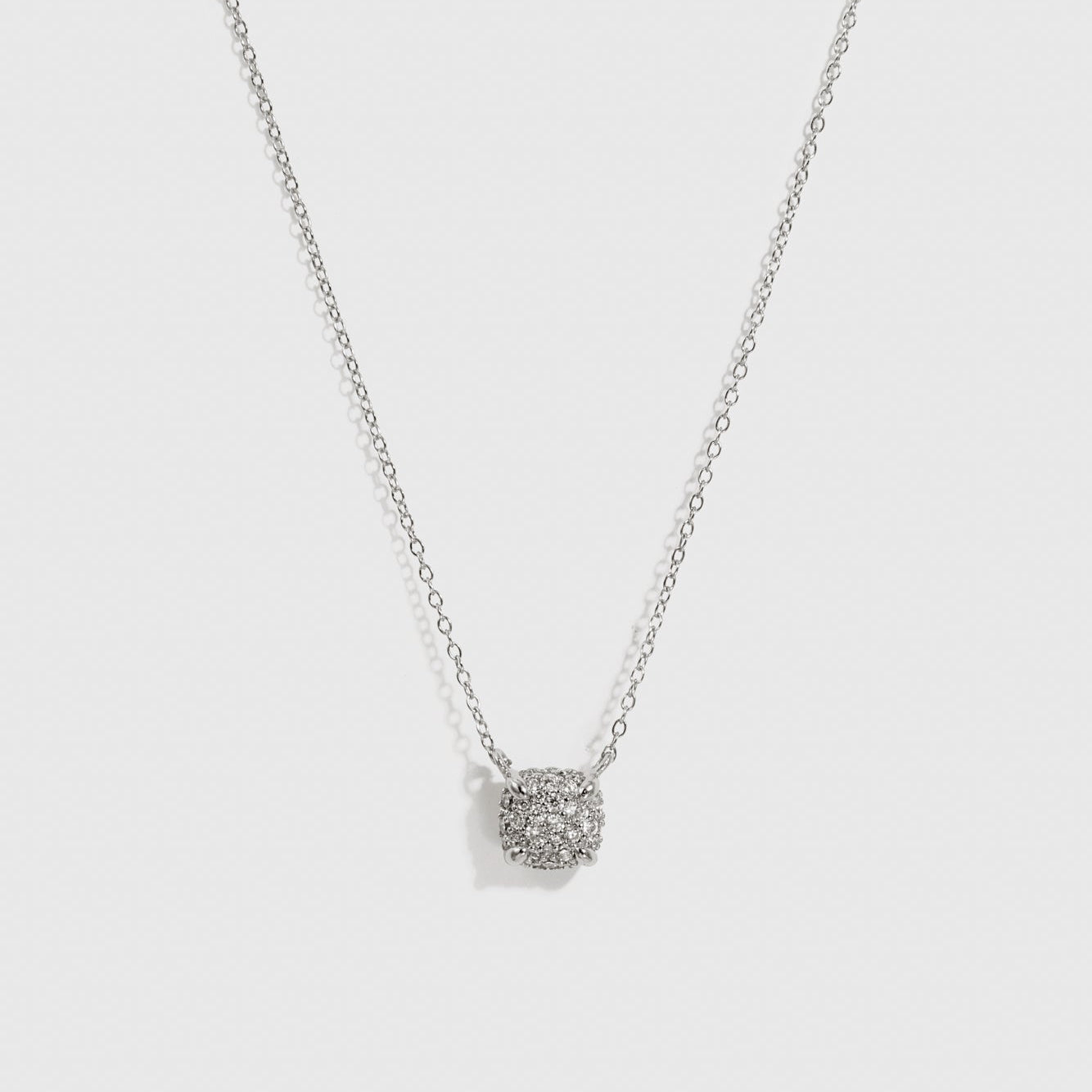 Sterling silver 925 square pavé pendant necklace with cubic zirconia, shown on a plain background.