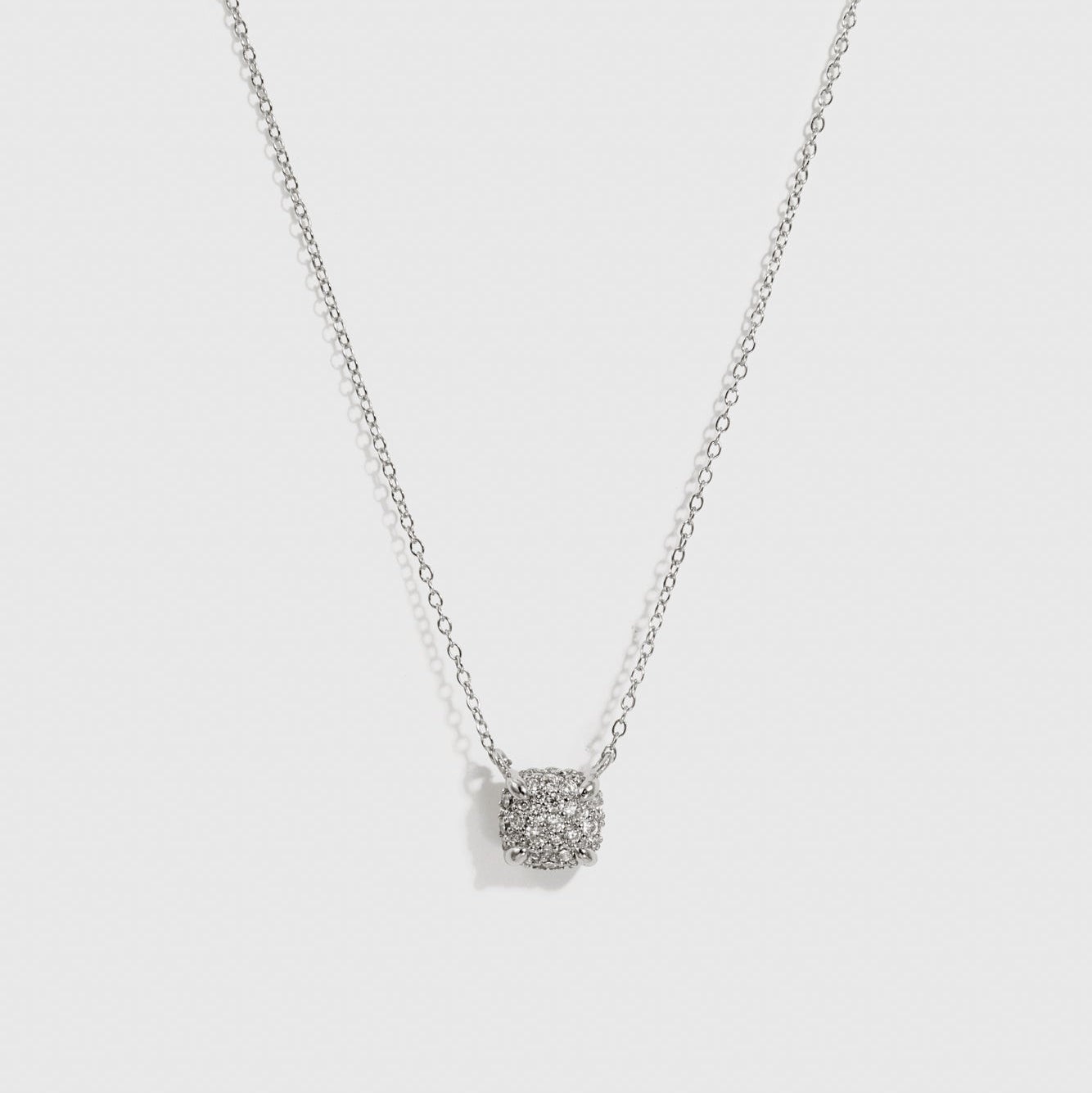 Sterling silver 925 square pavé pendant necklace with cubic zirconia, shown on a plain background.