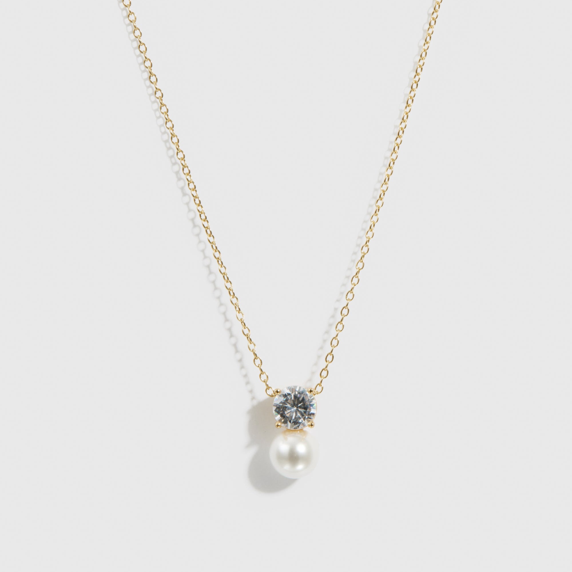 14k gold plated sterling silver 925 round-cut and glass pearl pendant necklace, shown on a plain background.