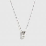 Sterling silver 925 round-cut and glass pearl pendant necklace, shown on a plain background.