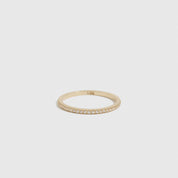 14k solid gold half eternity pavé ring with lab-grown diamonds, shown on a plain background.