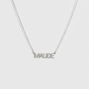 Sterling silver 925 personalized block font nameplate necklace, shown on a plain background.