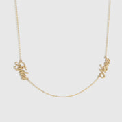 14k solid gold personalized cursive font two nameplates necklace, shown on a plain background.