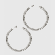 Silver plated large hollow hoop earrings, shown on a plain background.