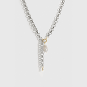 Silver plated N.6 lariat necklace with a baroque freshwater pearl, shown on a plain background.