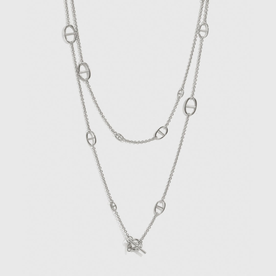 Silver plated mariner lariat necklace, shown on a plain background.