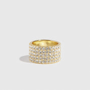 14k gold plated sterling silver 925 cigar pavé band with cubic zirconia, shown on a plain background.
