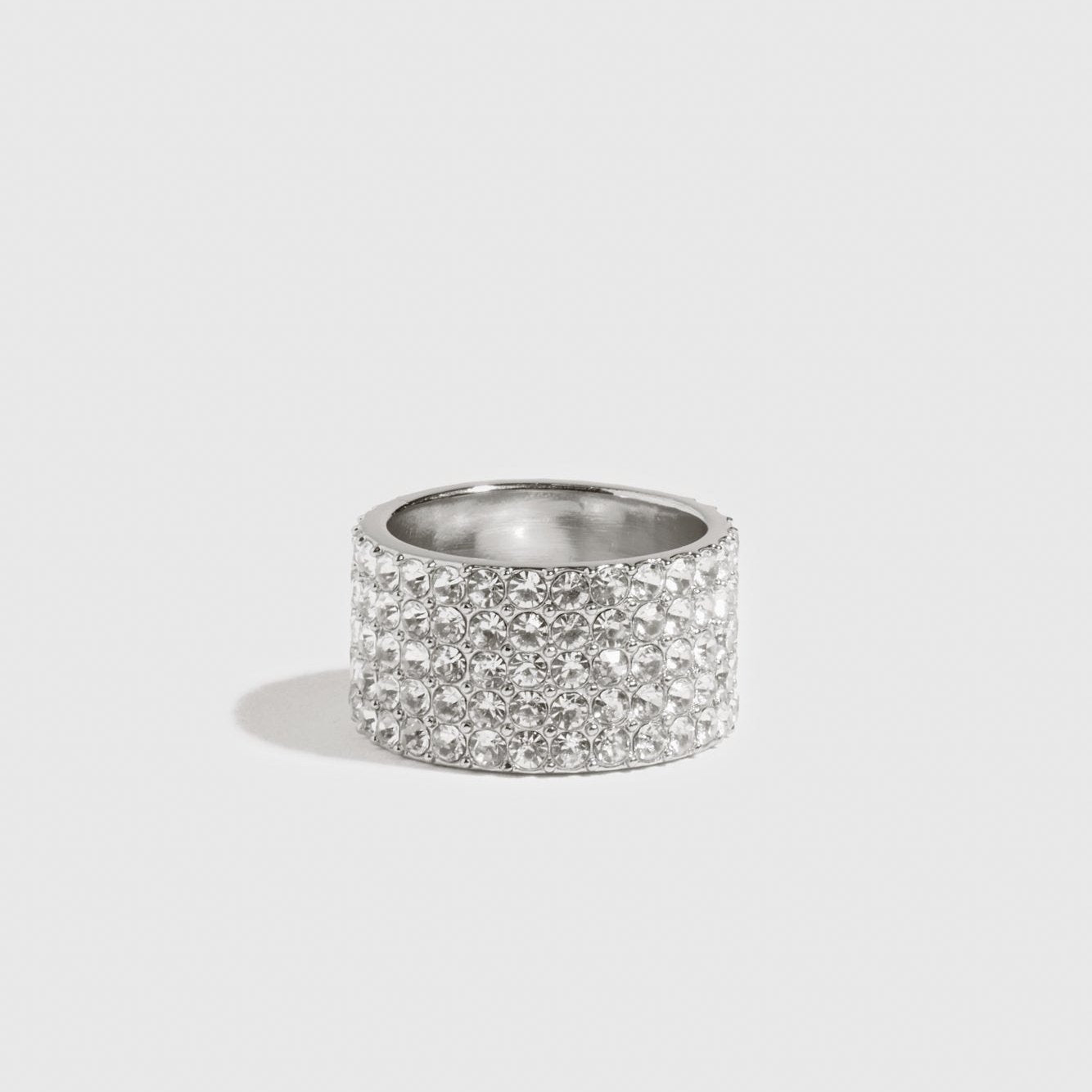 Sterling silver 925 cigar pavé band with cubic zirconia, shown on a plain background.