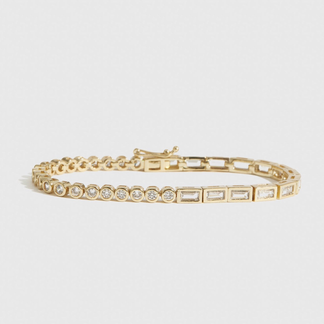 14k gold plated Blair tennis bracelet with cubic zirconia, shown on a plain background.