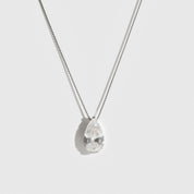 Sterling silver 925 solitaire teardrop pendant necklace with a teardrop cubic zirconia, shown on a plain background.