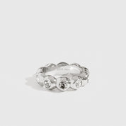 Sterling silver 925 puffy pavé ring with cubic zirconia, shown on a plain background.