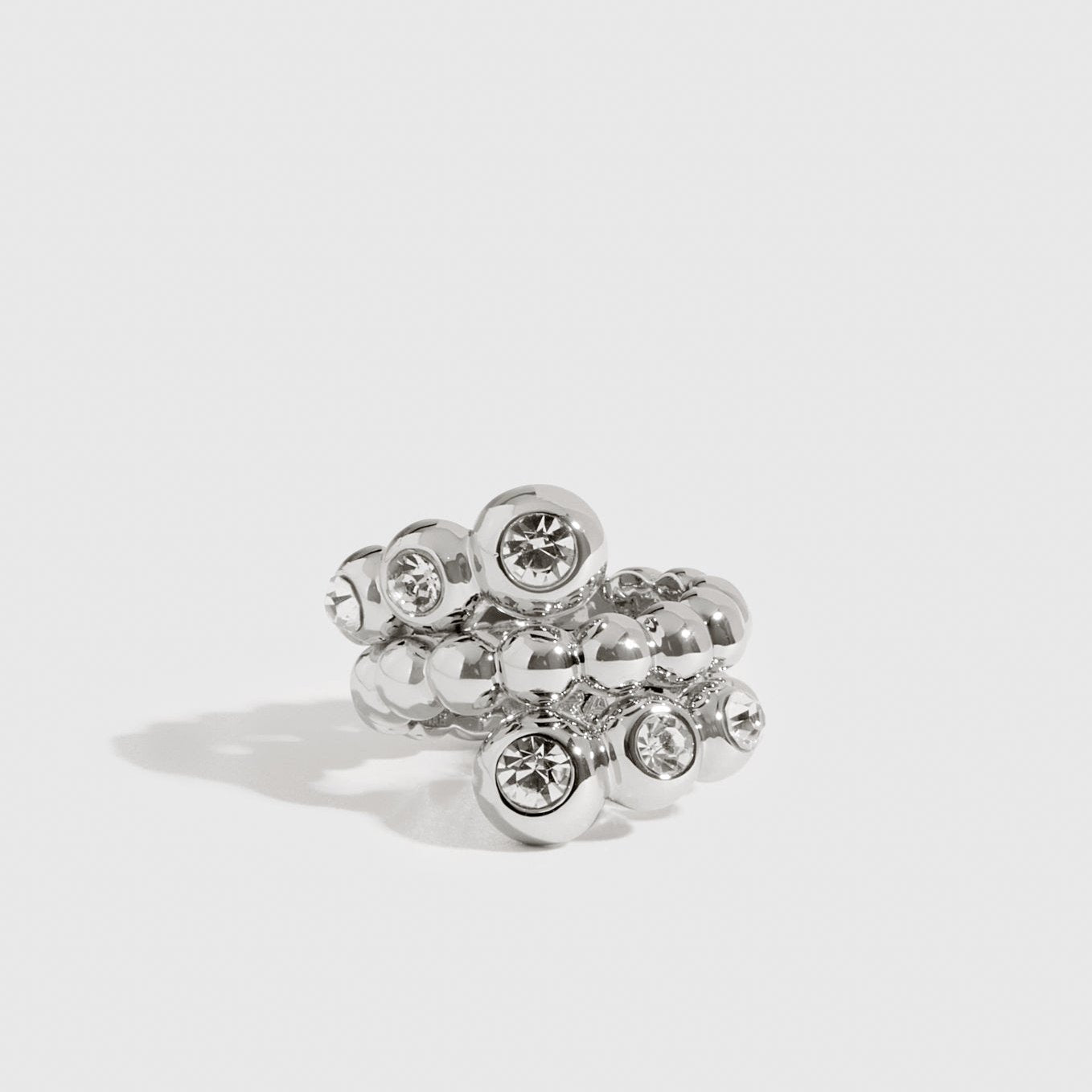Silver plated serpentine puffy ring, shown on a plain background.