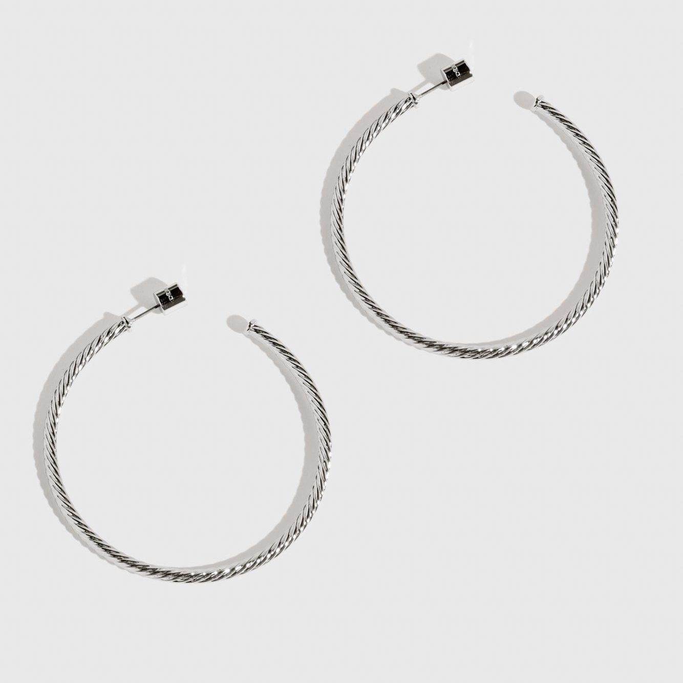 Silver plated maxi bare braided hoops, shown on a plain background.