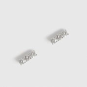 Sterling silver 925 ear bar stud with three cubic zirconia, shown on a plain background.