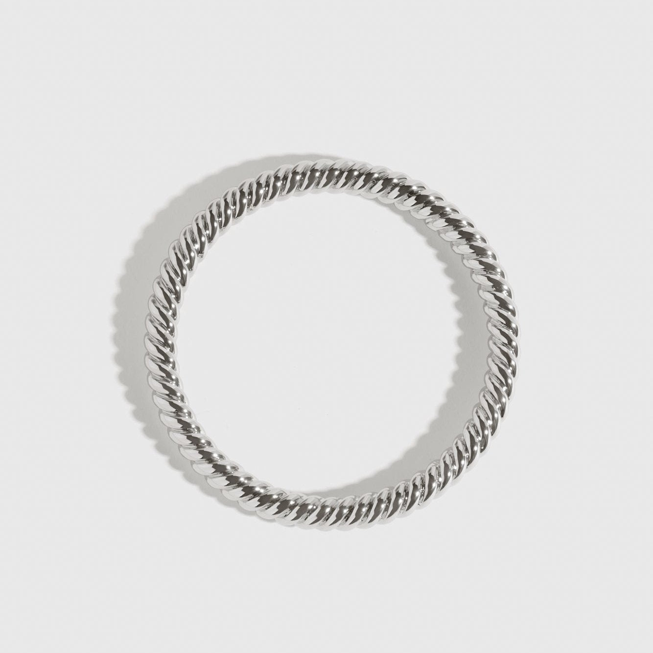 Silver plated braided bangle, shown on a plain background.