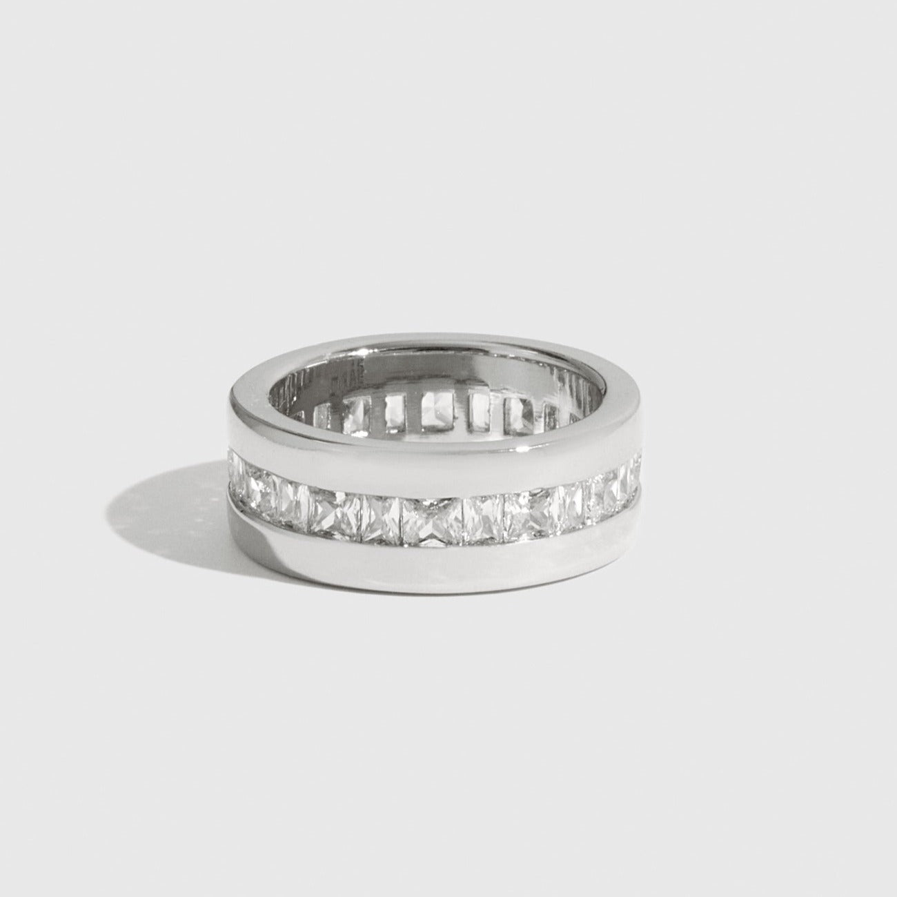 Sterling silver 925 square and baguette ring with square and baguette cubic zirconia, shown on a plain background.