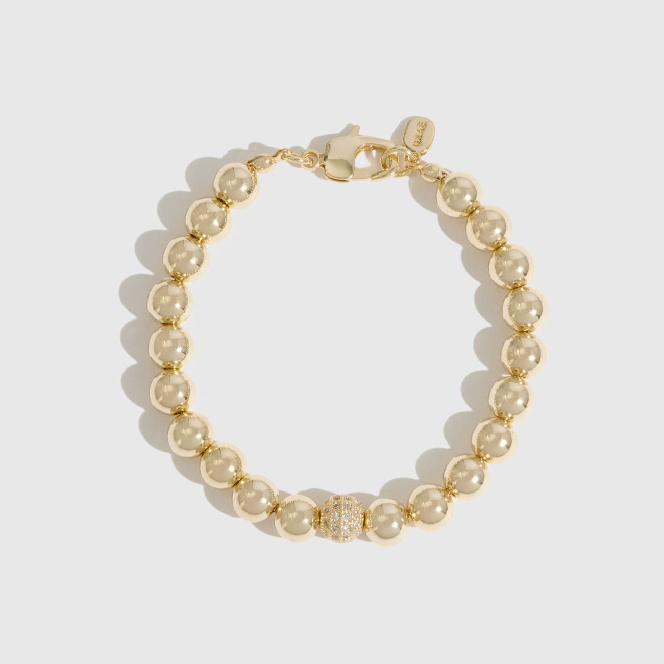 14k gold plated refined bracelet with cubic zirconia, shown on a plain background.