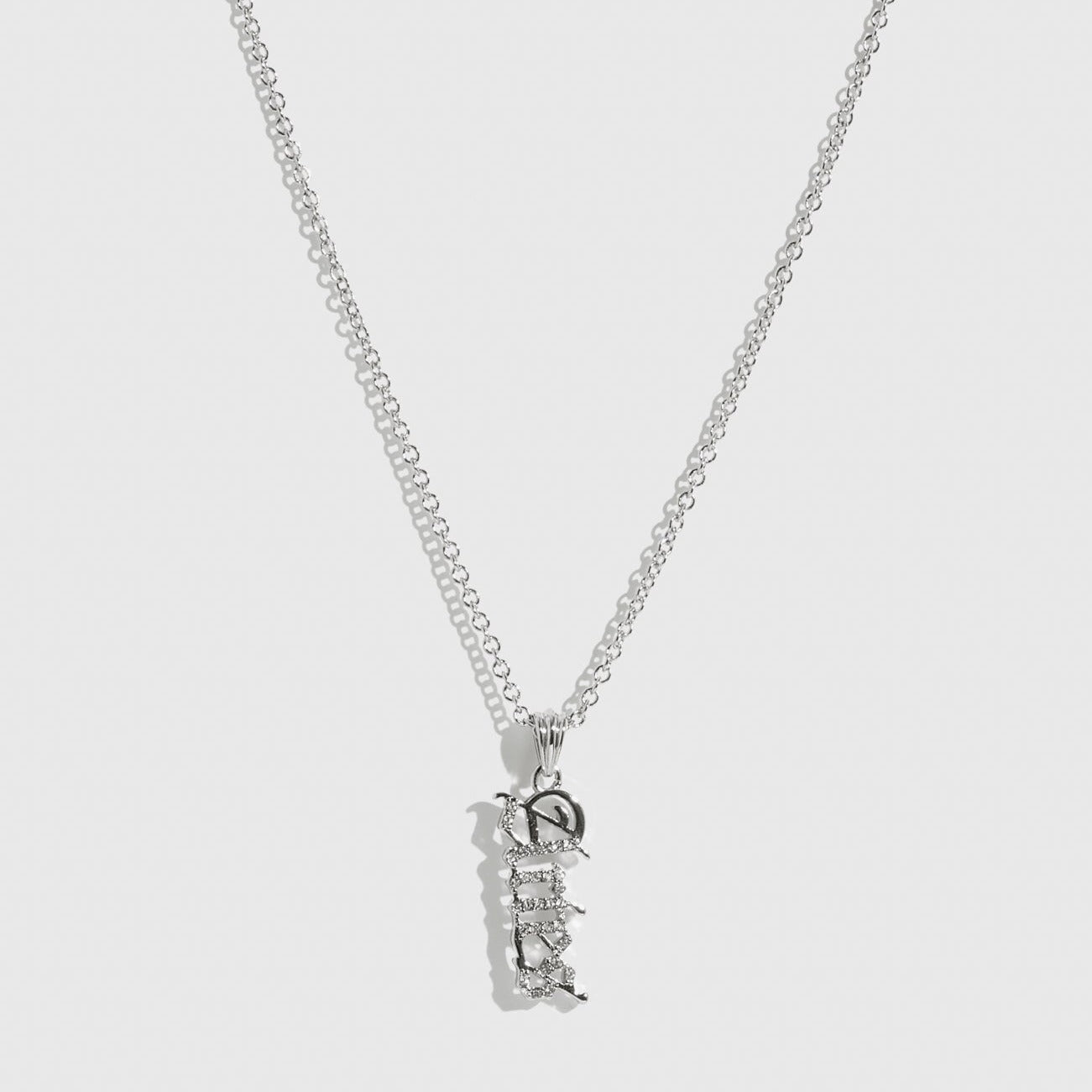 Sterling silver 925 zodiac pendant necklace with cubic zirconia, shown on a plain background.