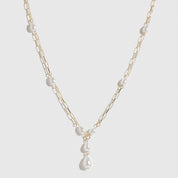 14k gold plated sterling silver 925 paper clips and pearls necklace with freshwater pearls, shown on a plain background.