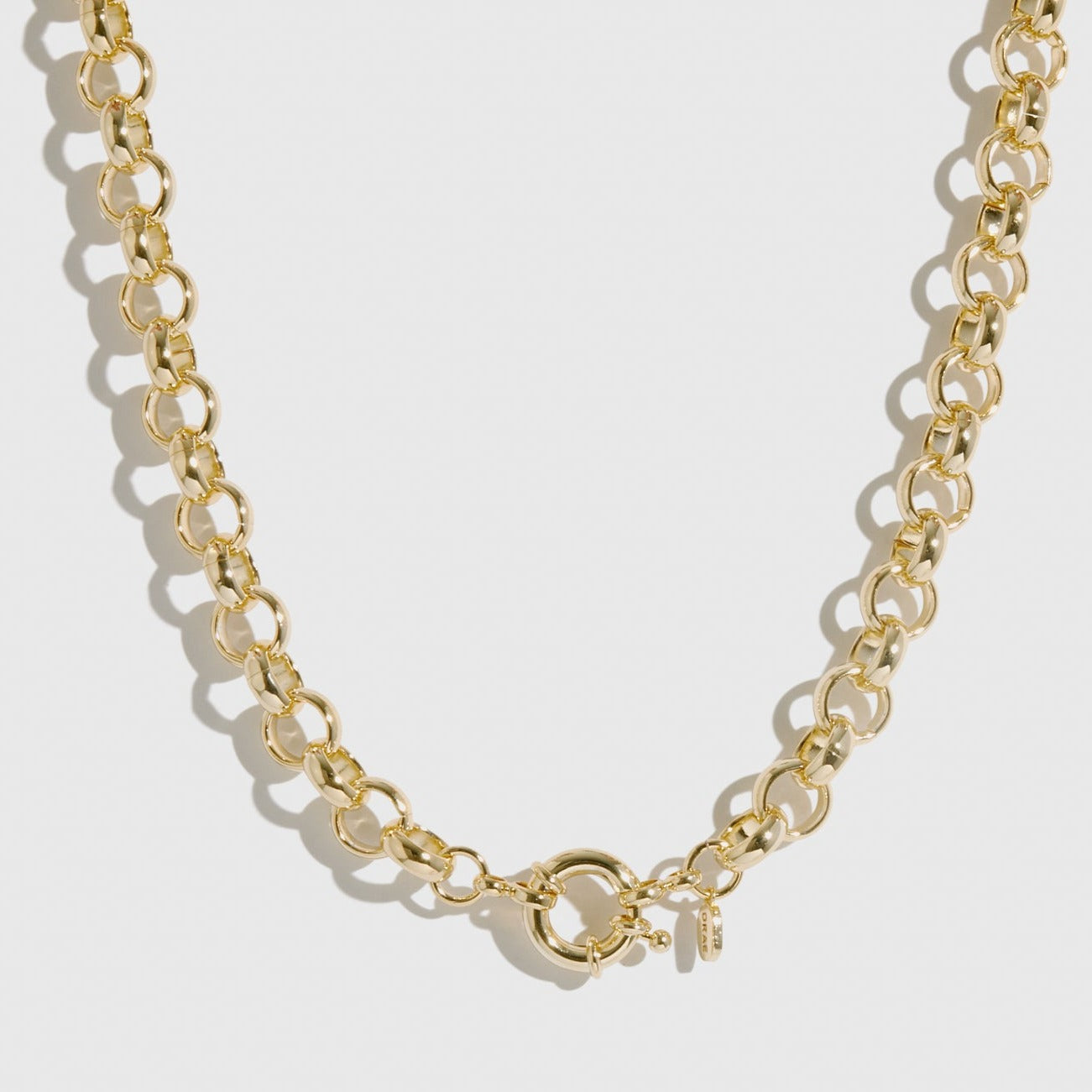14k gold plated maximalist rolo necklace, shown on a plain background.