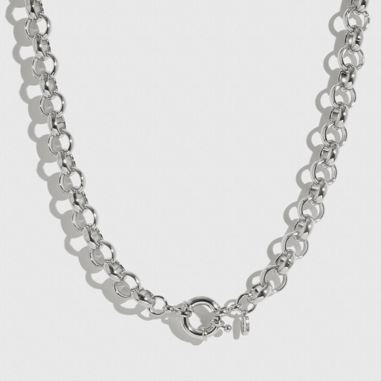 Silver plated maximalist rolo necklace, shown on a plain background.