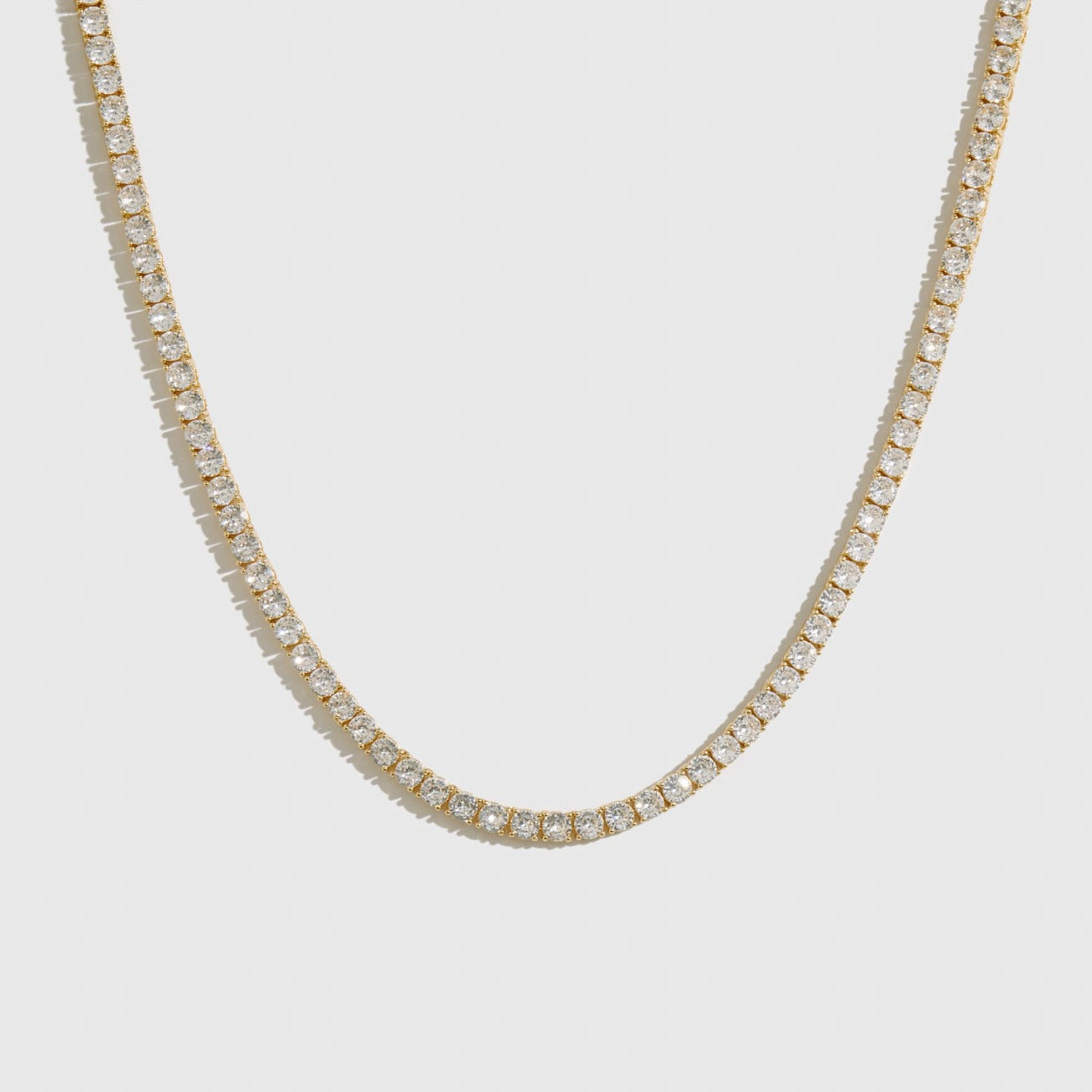 14k gold plated tennis choker with 4mm cubic zirconia, shown on a plain background.